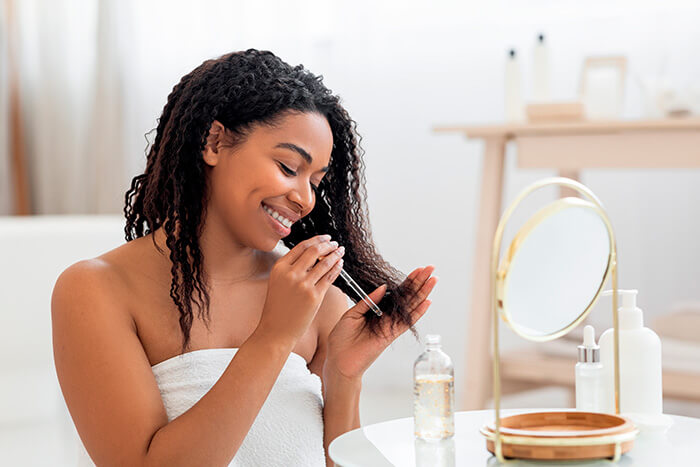 por que usar óleo para cabelo crespo